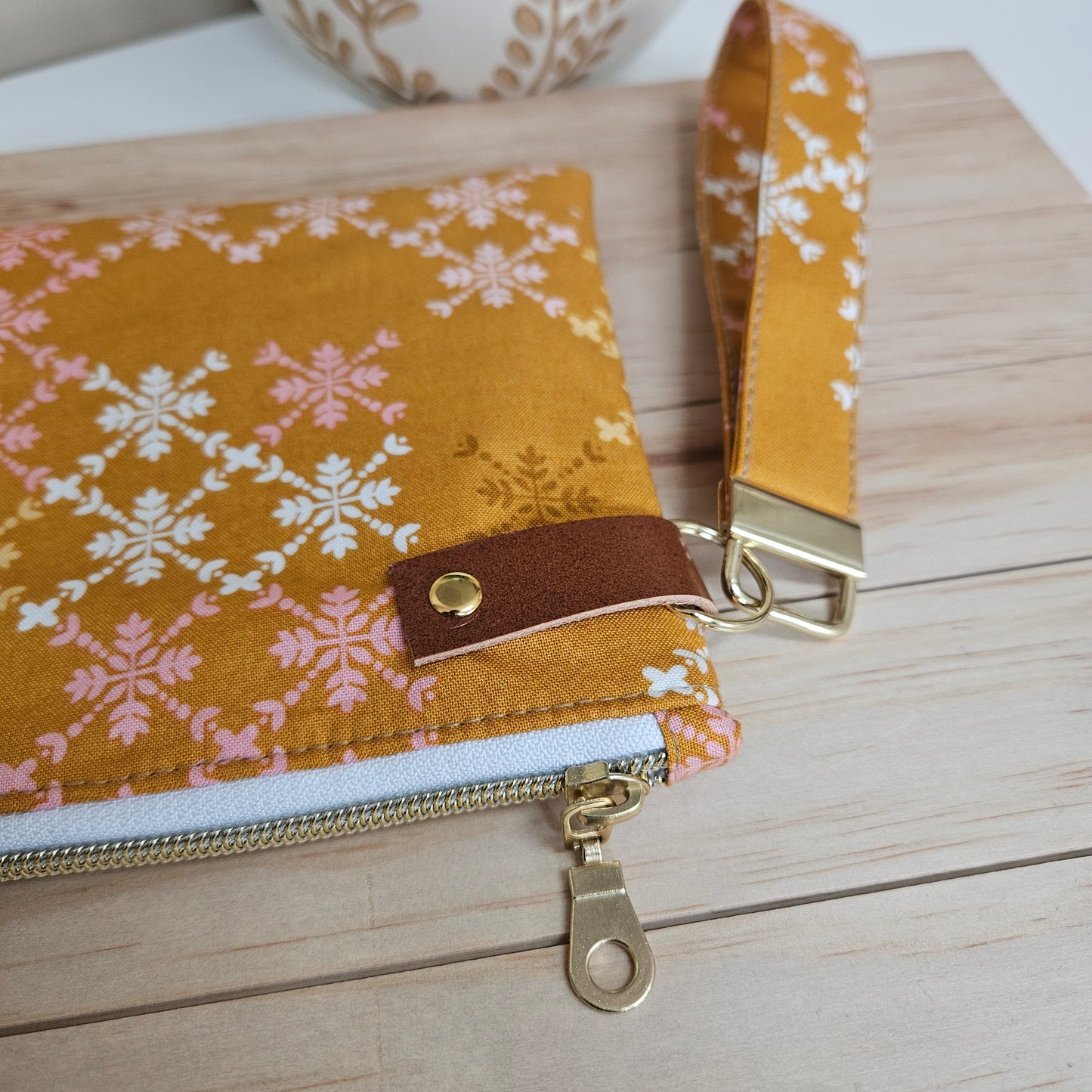 Gold Hampton wristlet