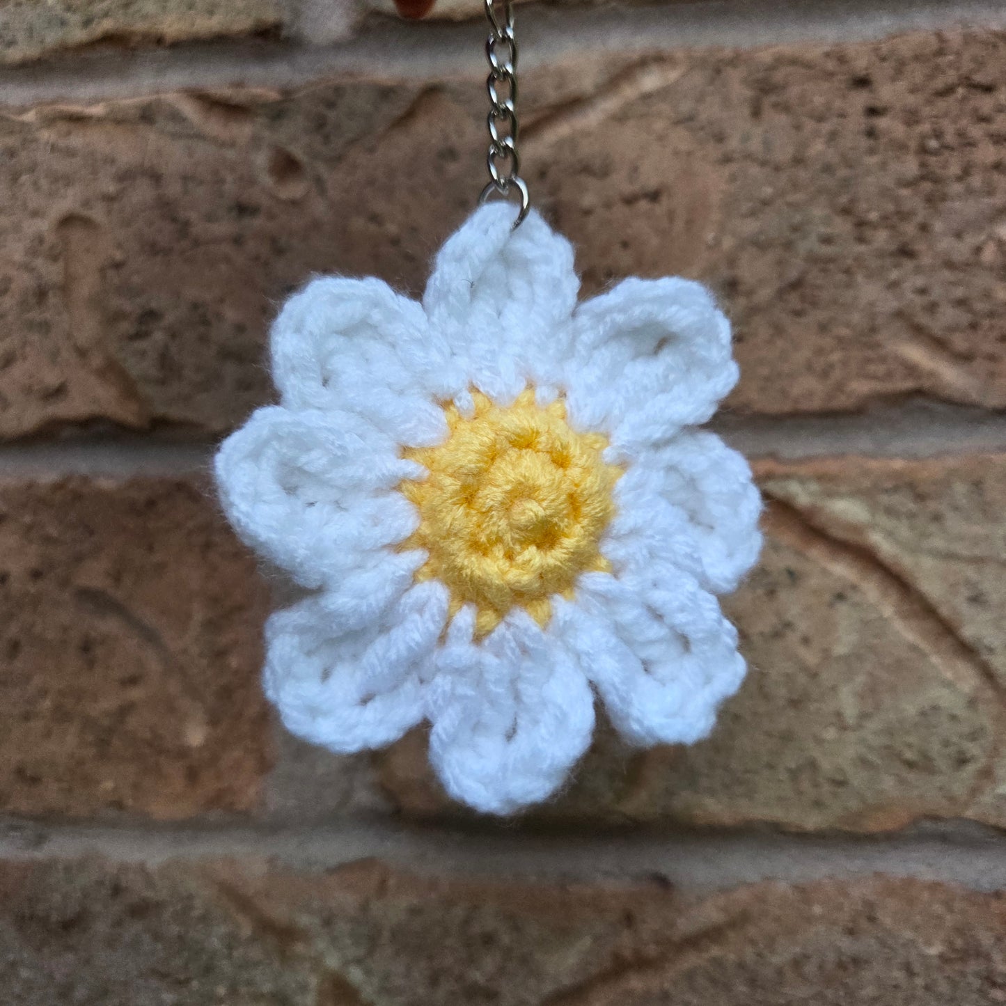 Crochet daisy flower on a chain