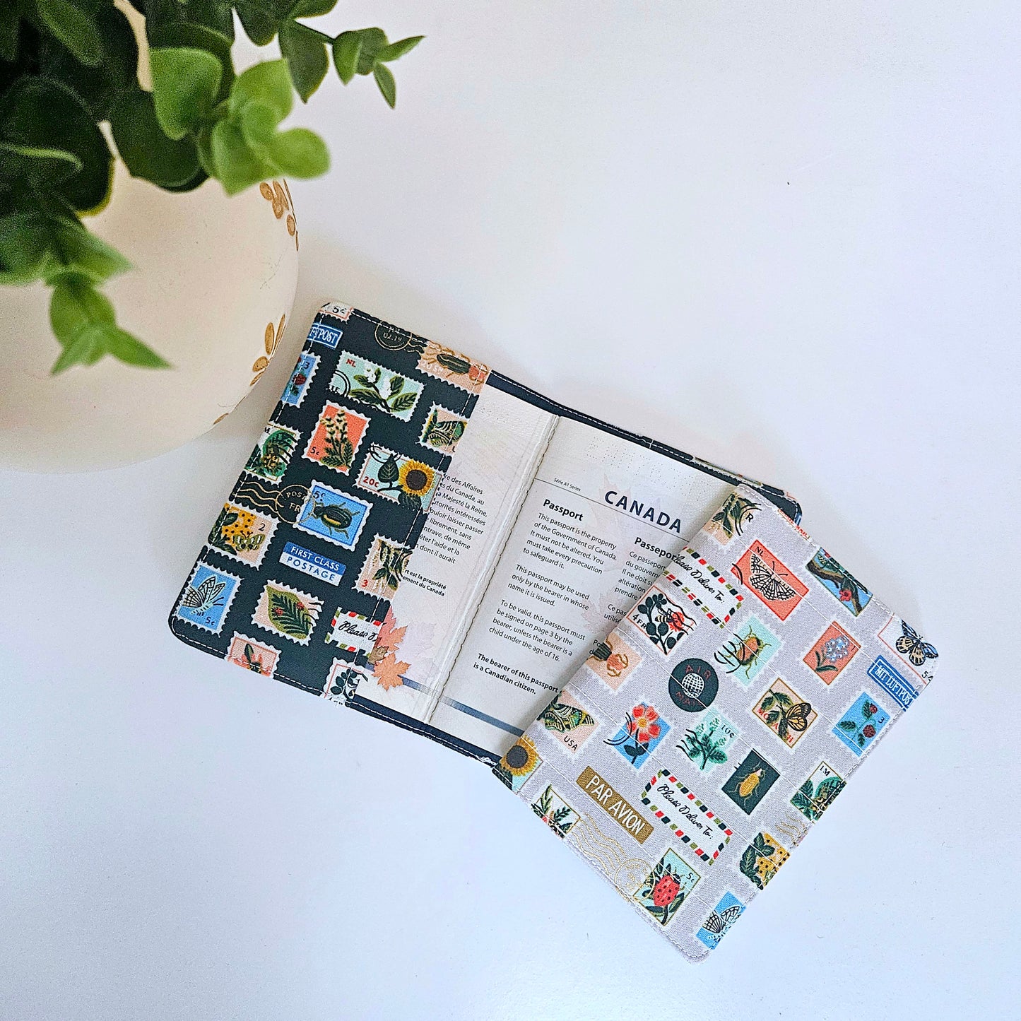 Blue travel case for passports with floral print