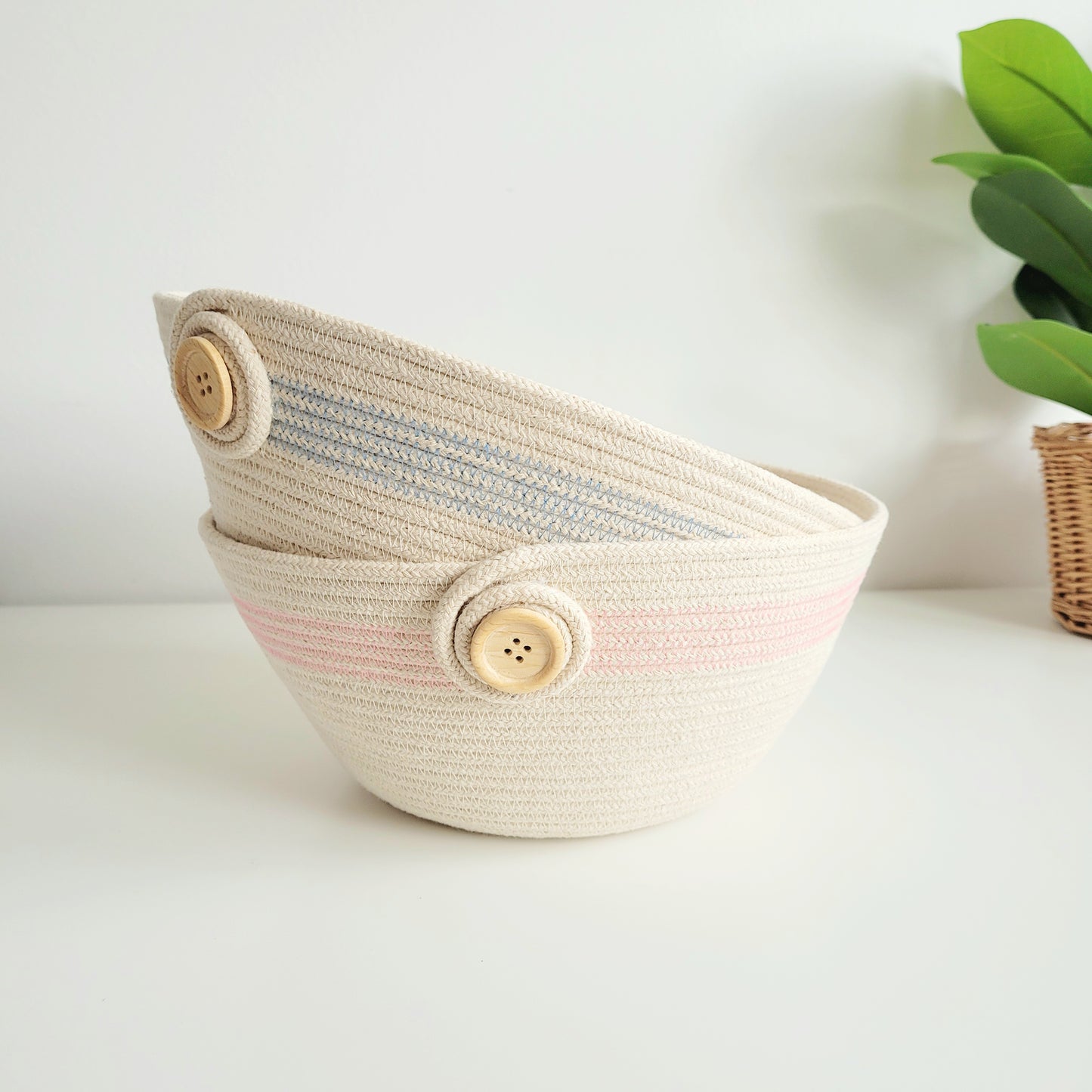 Close-up of cotton rope texture and stitched details in pink & blue