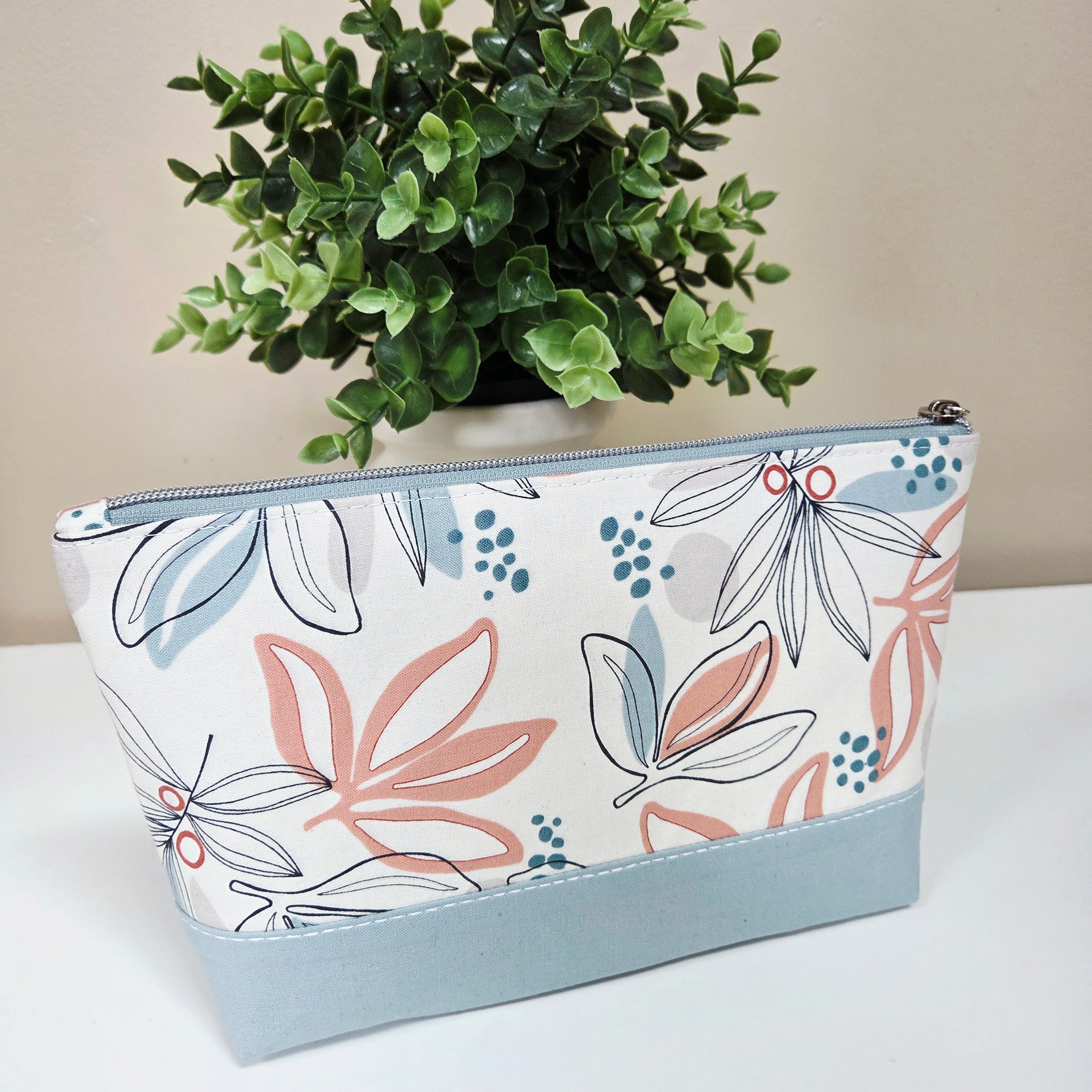 Cosmetic bag with pink flower pattern made in Canada