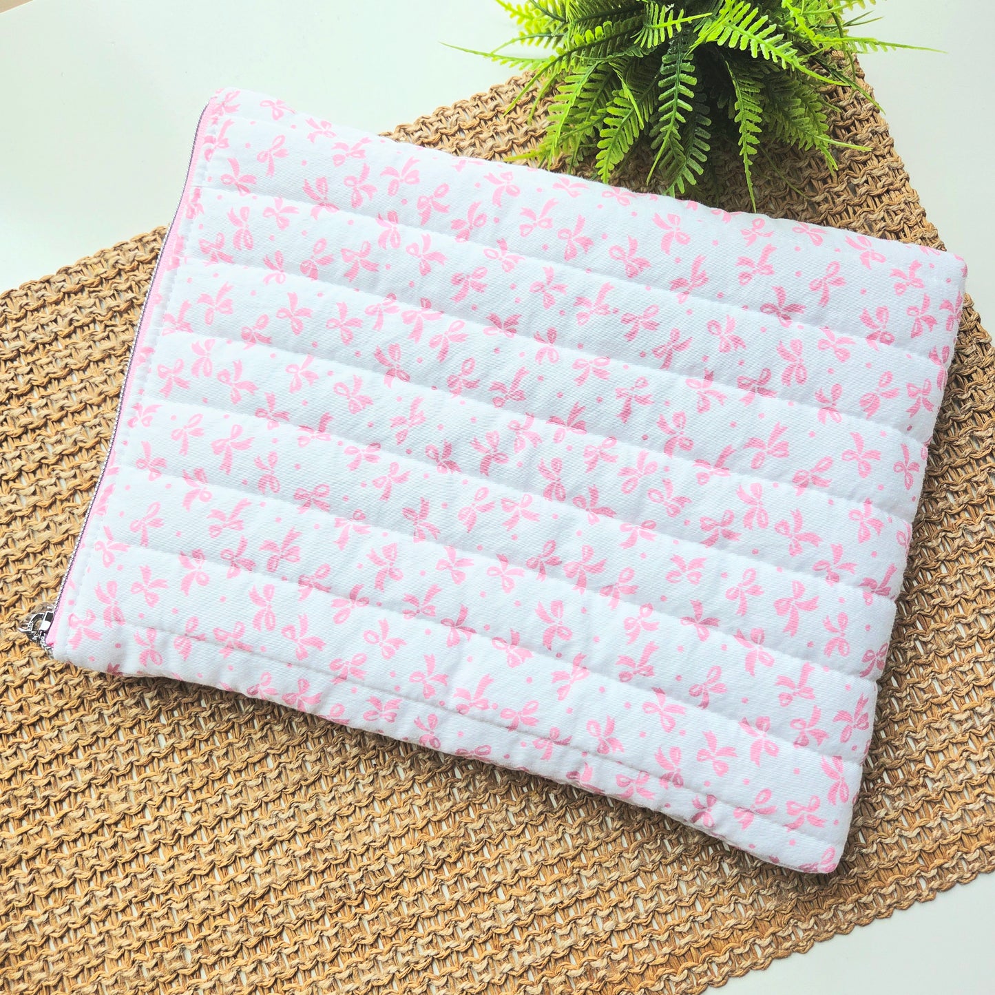 Handmade quilted iPad sleeve in bows fabric