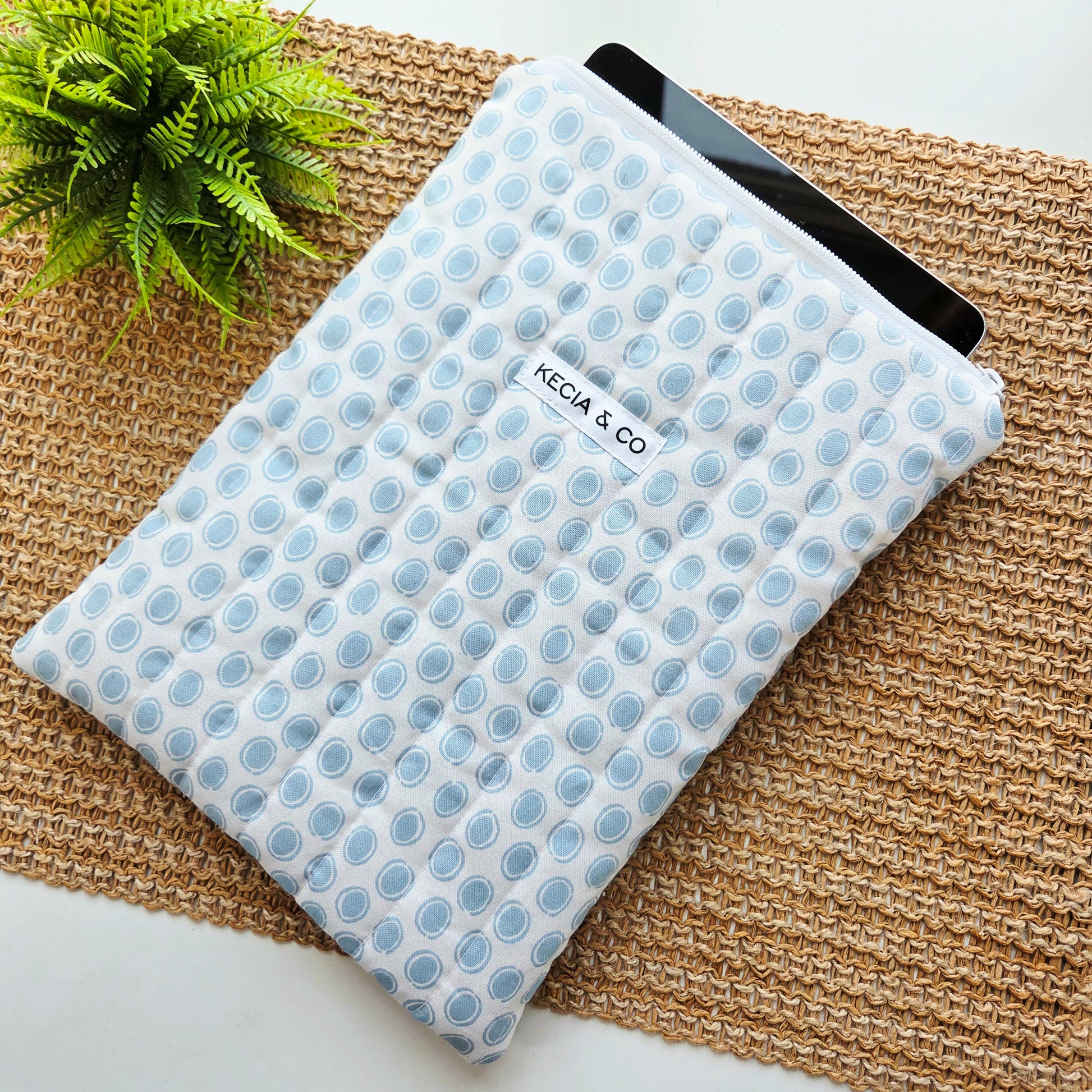 Quilted iPad sleeve with soft blue pebble pattern by Kecia & Co