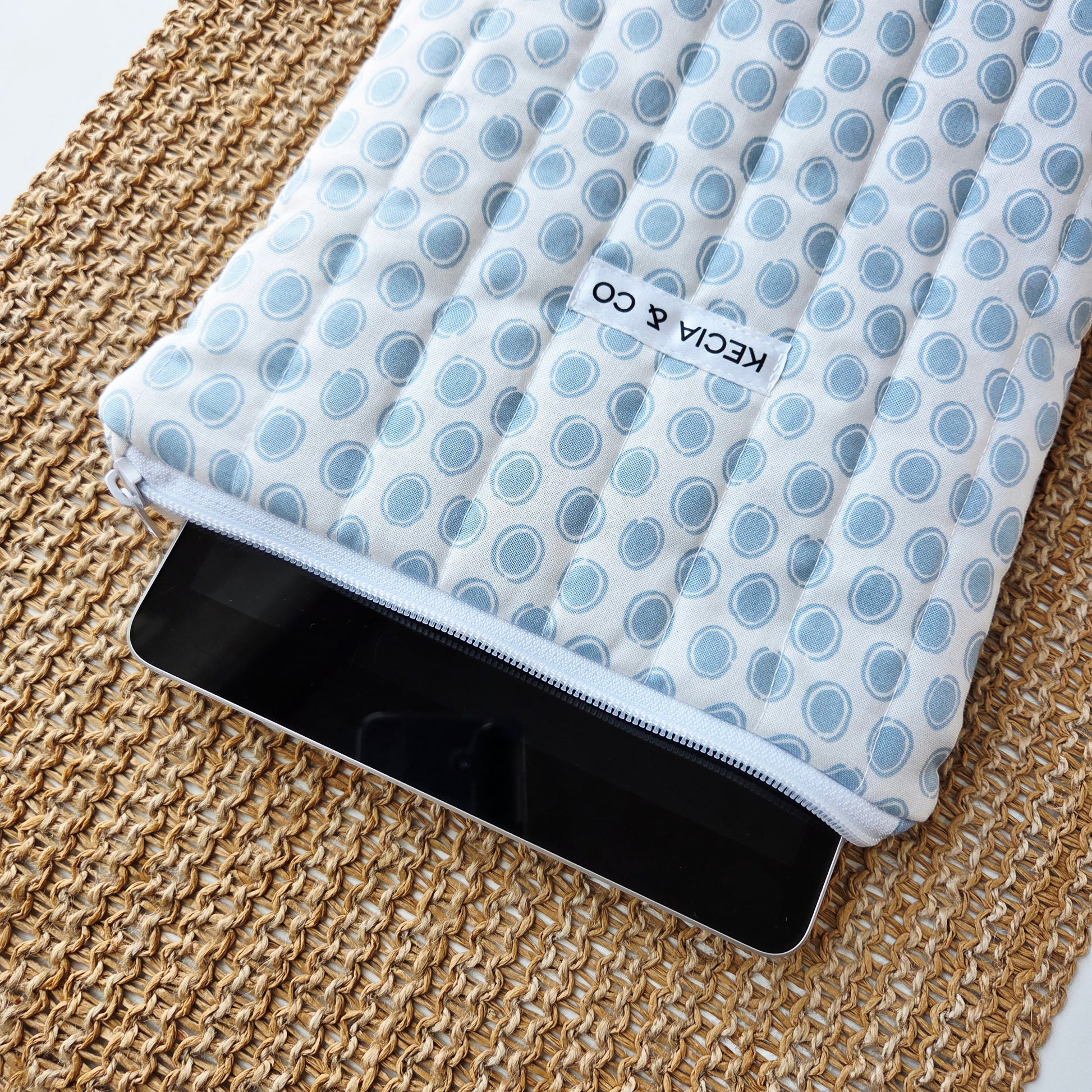 Light blue polka dot quilted tablet sleeve with zipper, perfect for iPads, handmade in Canada by Kecia & Co.