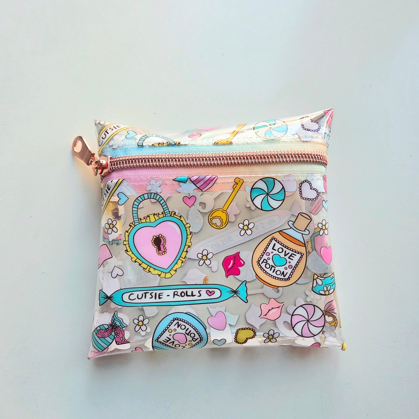 Small pouch with colorful design on a light gray background