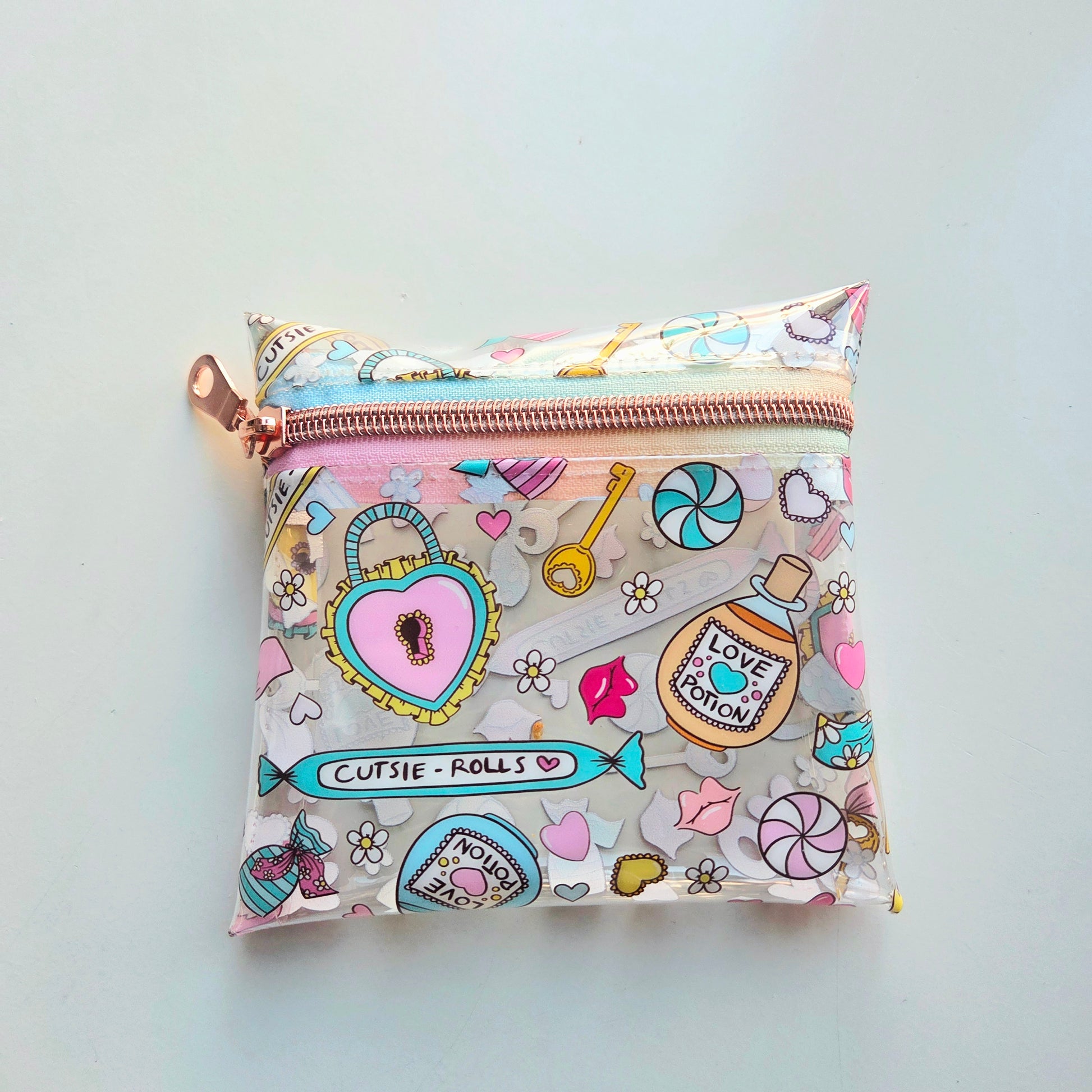 Small pouch with colorful design on a light gray background