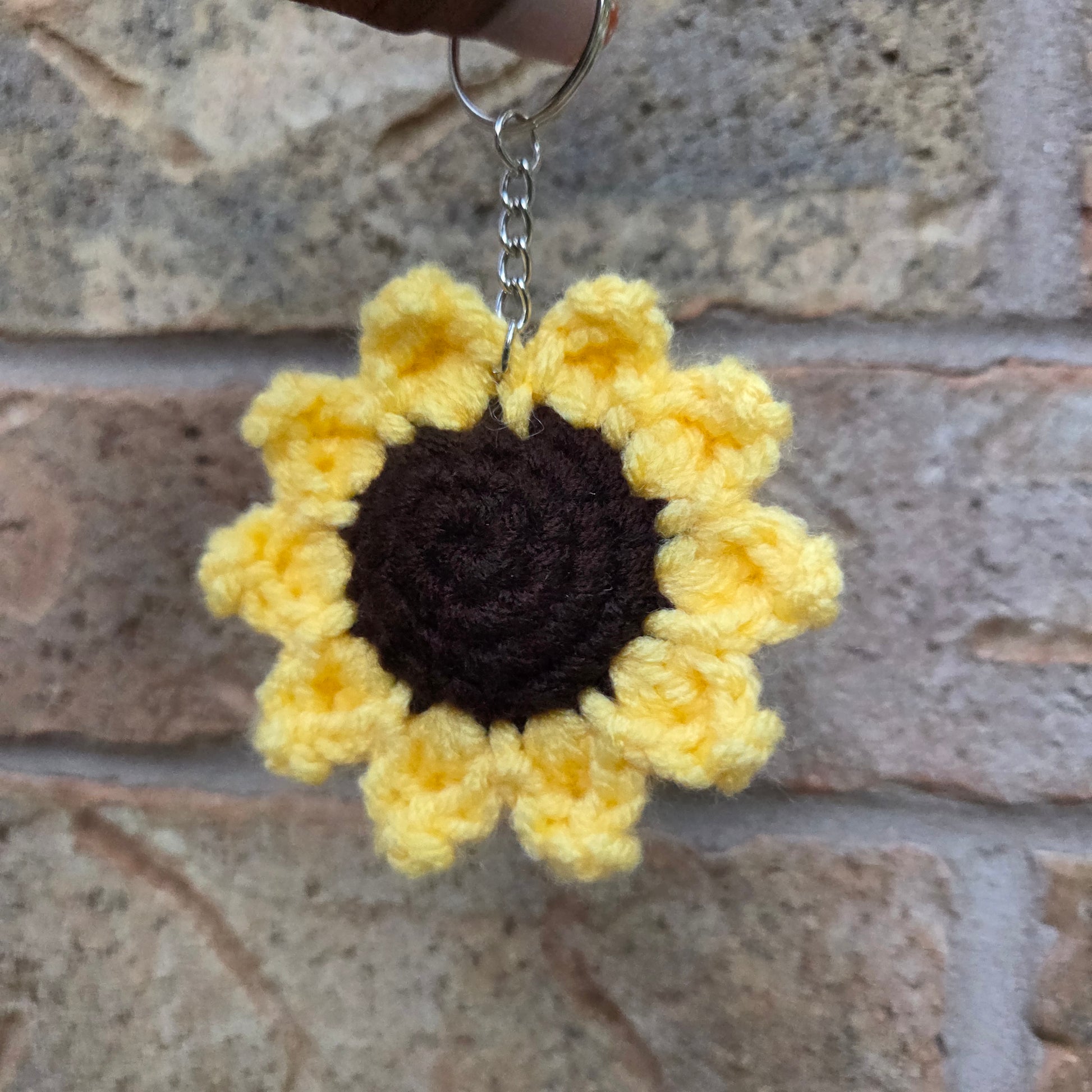 Crochet sunflower and daisy keychains handmade with yarn