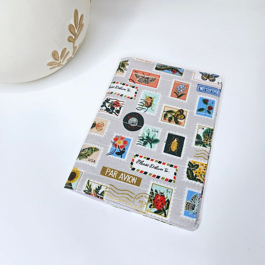 Khaki passport cover with botanical print