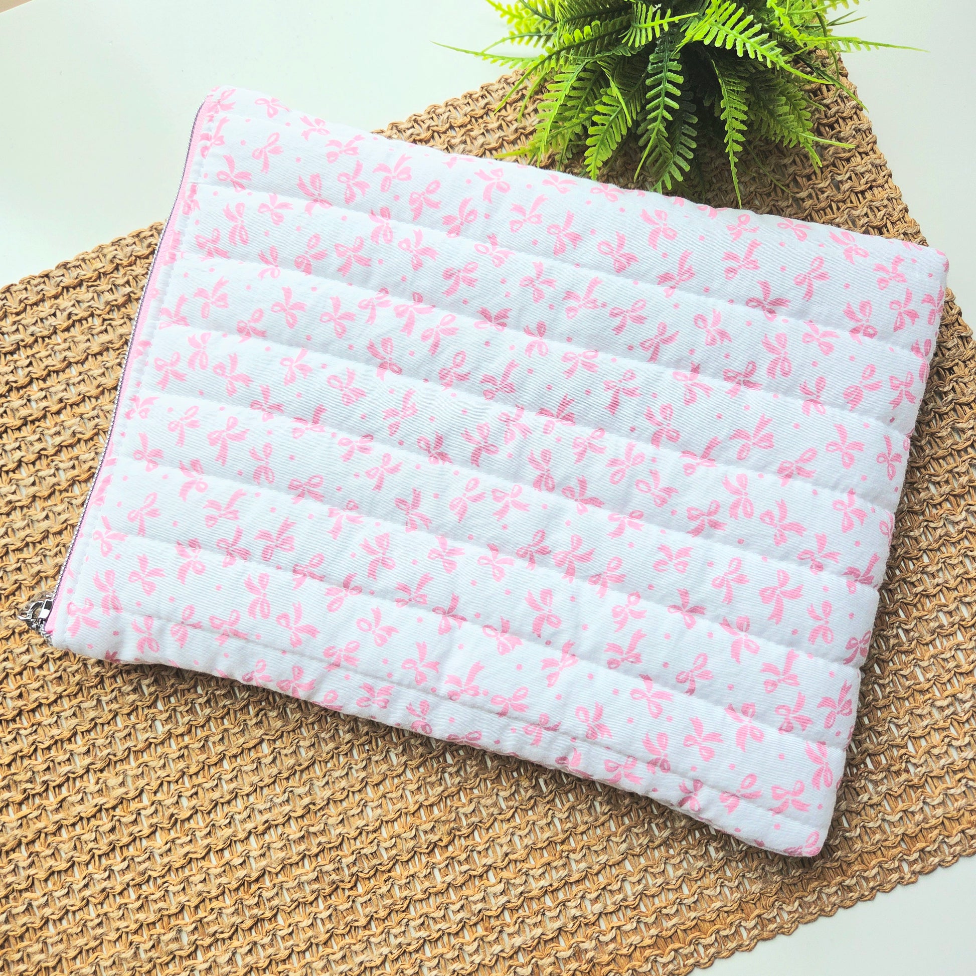 Handmade quilted iPad sleeve in bows fabric
